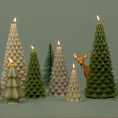 Set of green Christmas tree-shaped candles