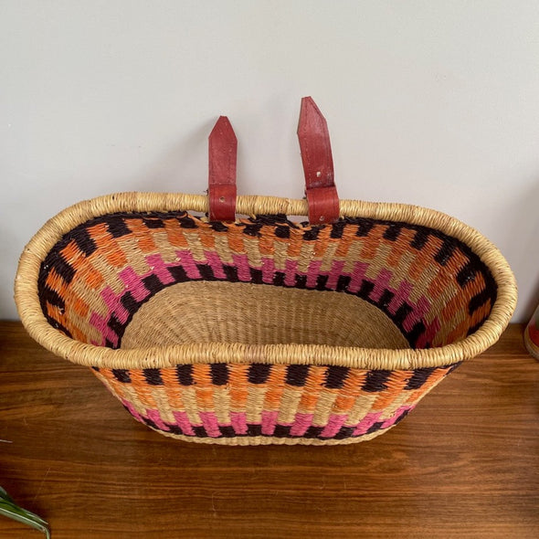 handwoven bike basket fairtrade orange pink black elephant grass