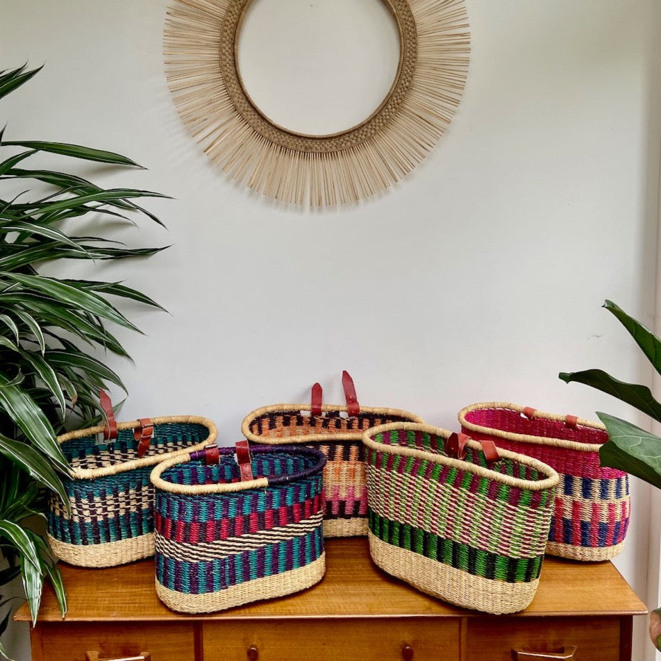 handwoven bike basket fairtrade orange pink black elephant grass