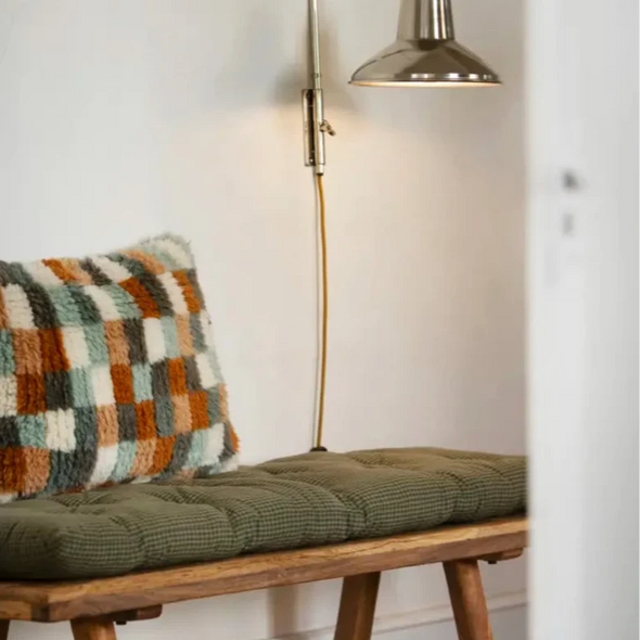 checked cotton mattress in forest green on wooden bench by Madam Stoltz