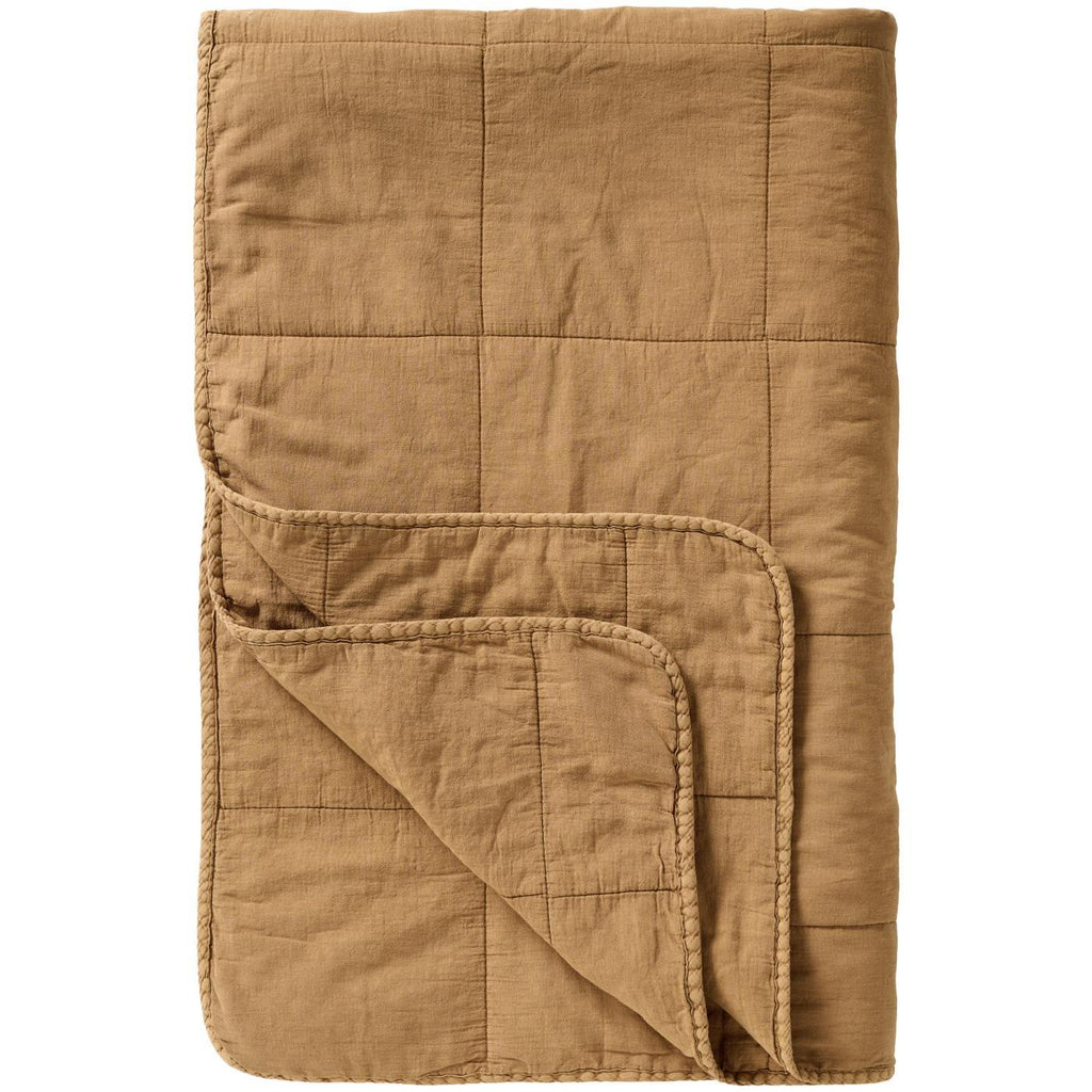 Brown quilted blanket Ib Laursen clay