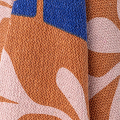 Atle throw Bloomingville brown pink blue close up
