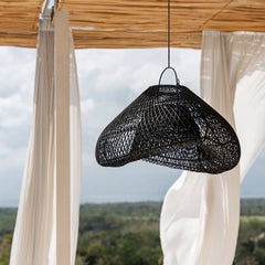 Black woven pendant light hanging covered outdoors
