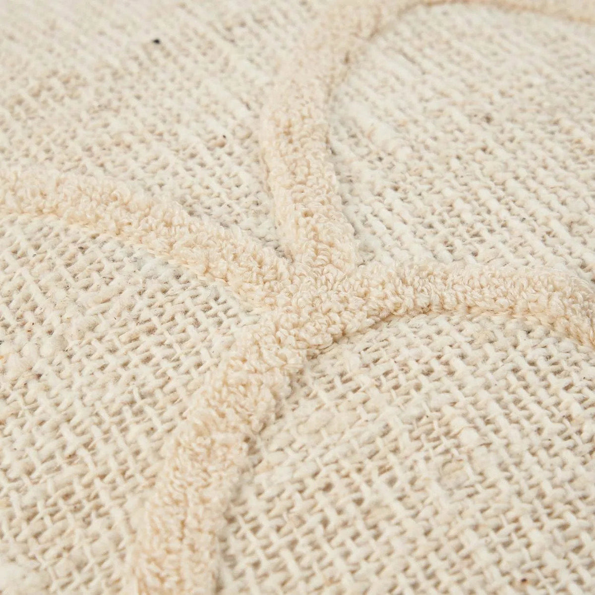 Close-up of a textured beige cushion