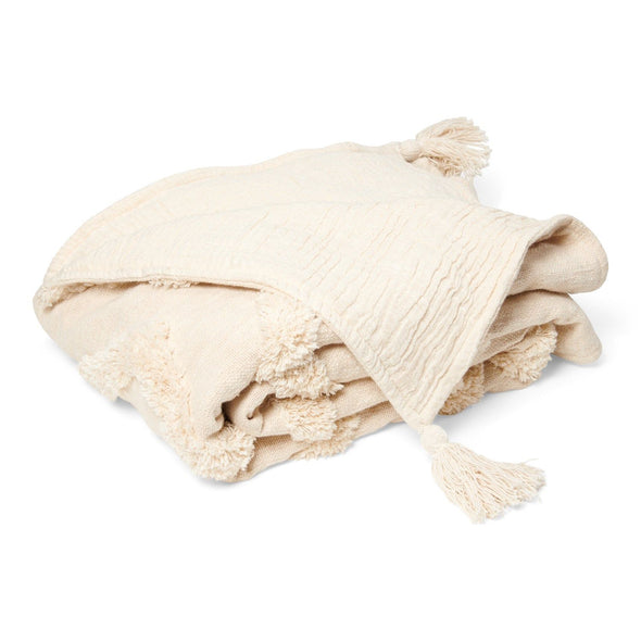 Beige tufted blanket with tassels Return to Sender