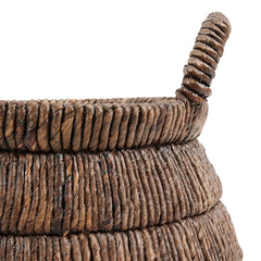 Close-up of a woven basket with a handle