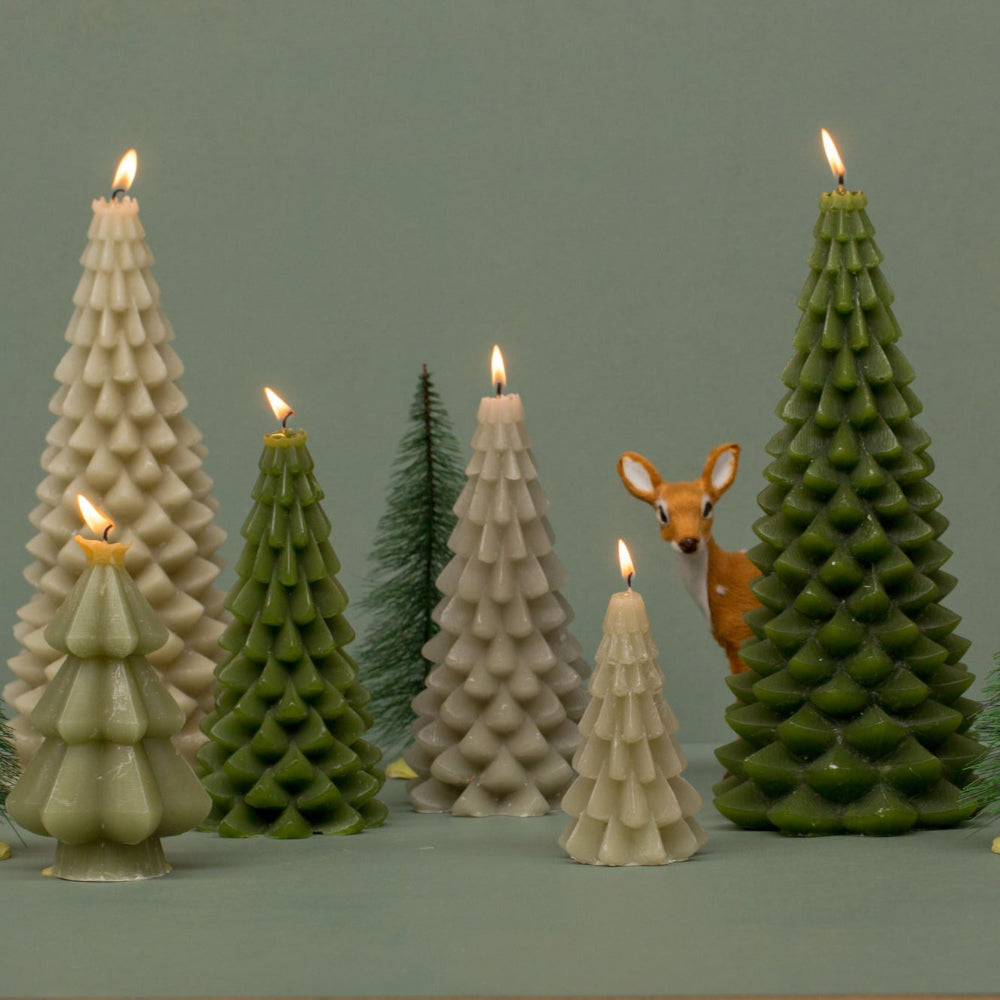 Set of green Christmas tree-shaped candles 
