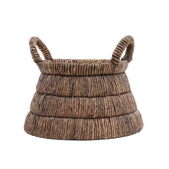 Woven brown banana leaf basket with handles 