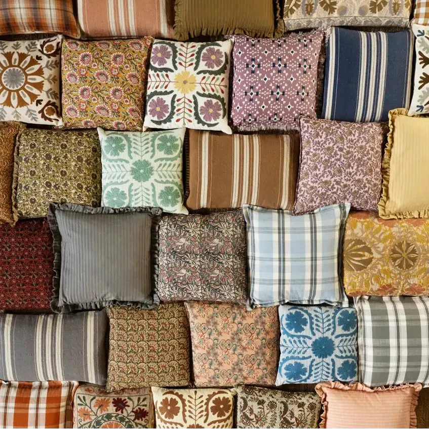 Collection of various patterned fabric squares arranged in a collage.