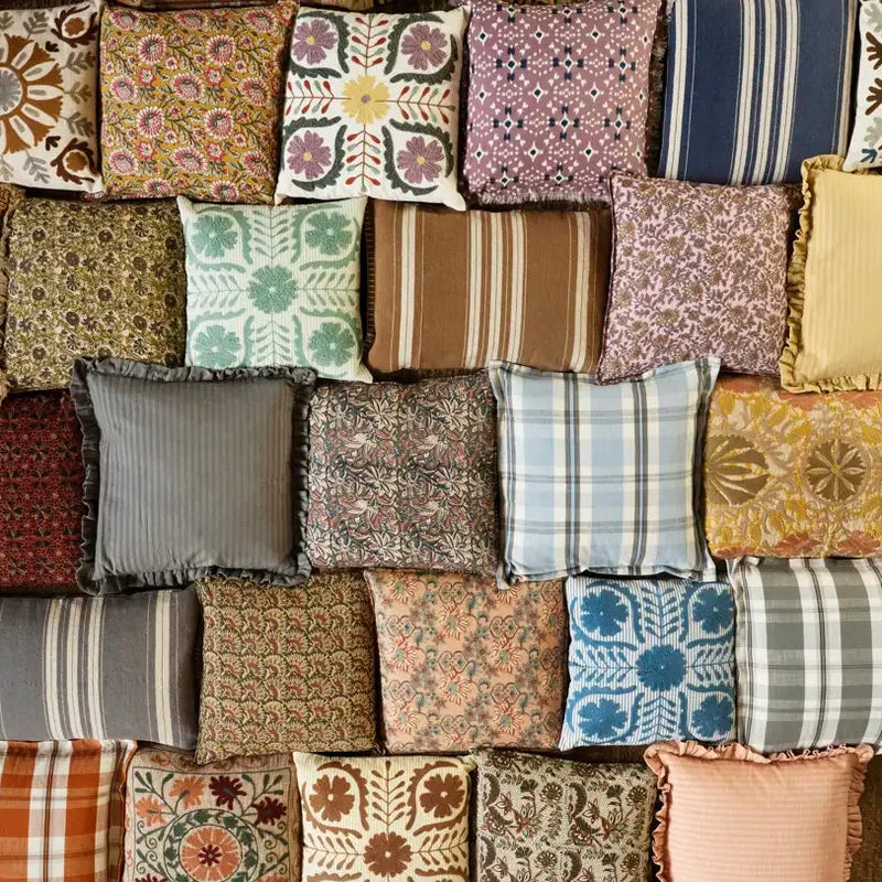 Collection of various patterned fabric squares arranged in a collage.