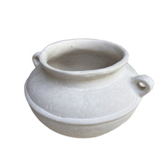 White paper mache pot with handles on a white background