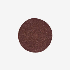 Round brown woven seagrass placemat Madam Stoltz