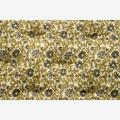 Floral patterned fabric with green and beige mattress