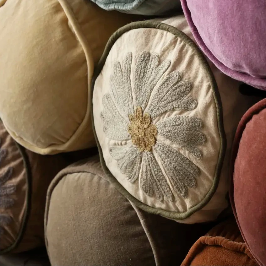 stack of bolster cushions 