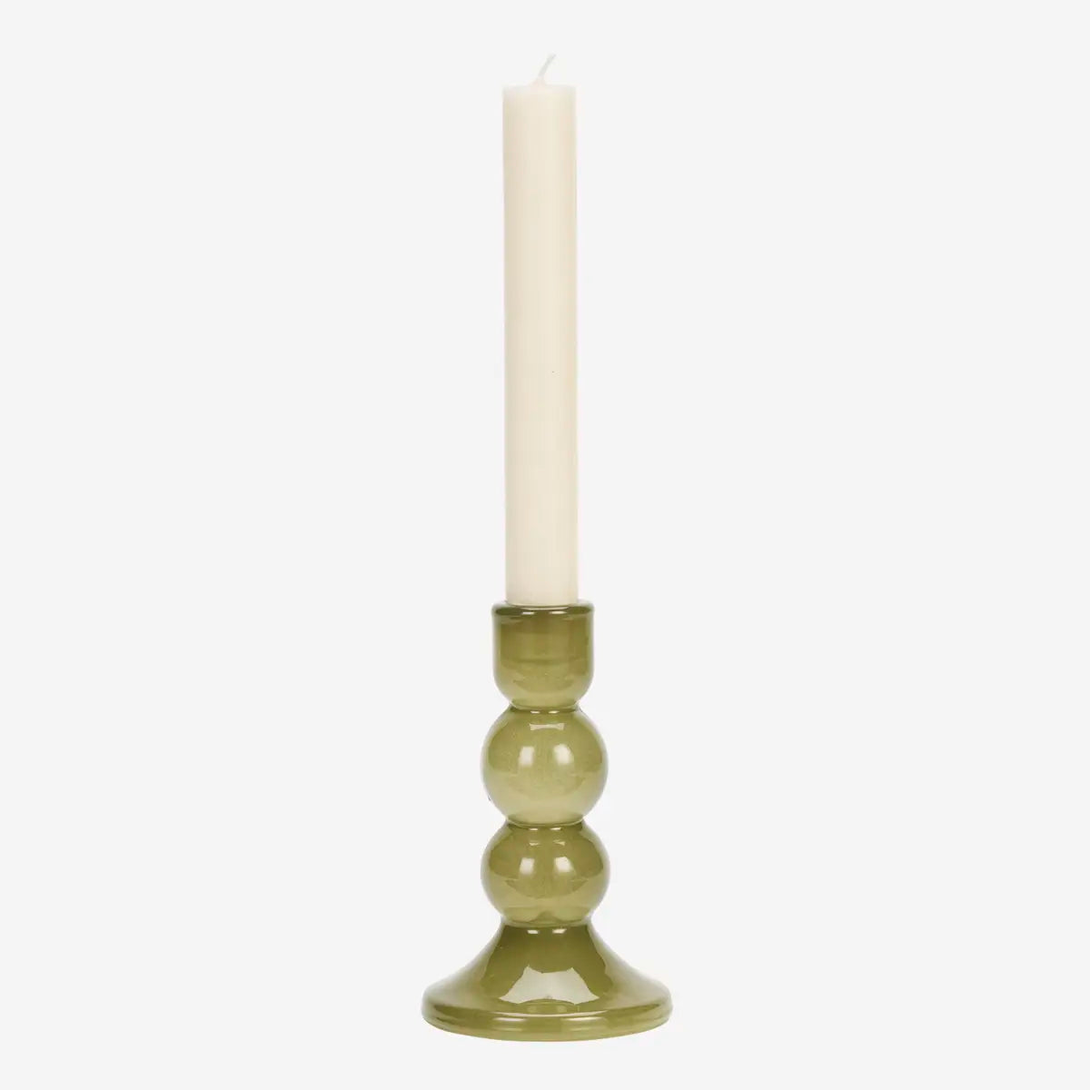 An olive green glass candlestick holder with a bulbous base design holding a single white taper candle, set against a plain light gray background.