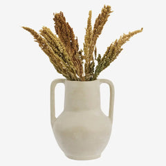 Off white handmade papier-mâché vase with dried plants 