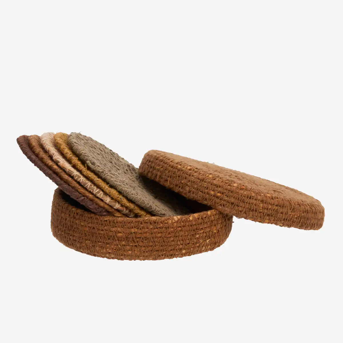 A set of round woven natural-fiber coasters or trivets