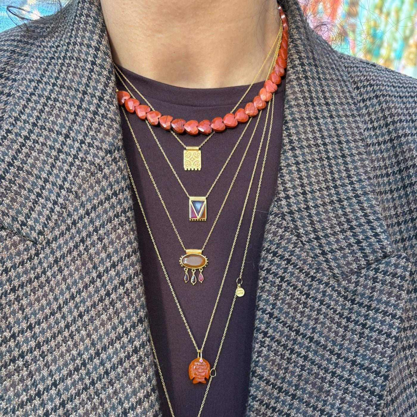Muja Juma stacked necklaces 