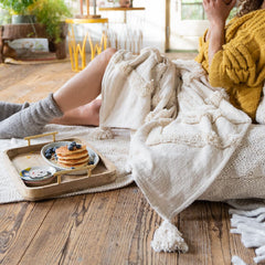 Return to Sender tufted throw blanket ecru