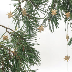 Anna Nera star garland palm tree leaves gold Xmas