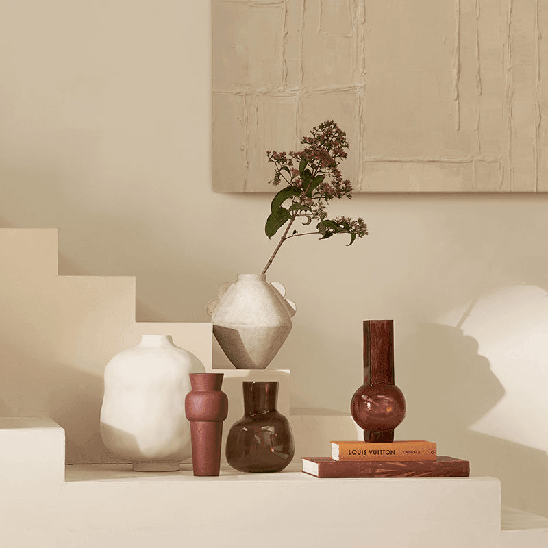 Collection of vases and a plant Urban Nature Culture