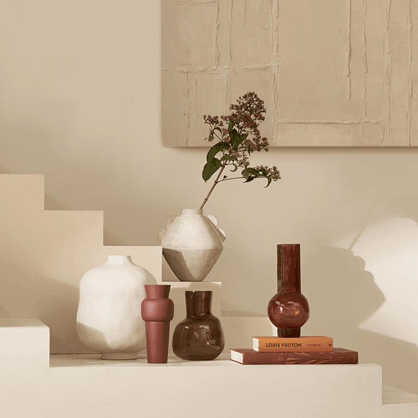 Collection of vases and a plant Urban Nature Culture