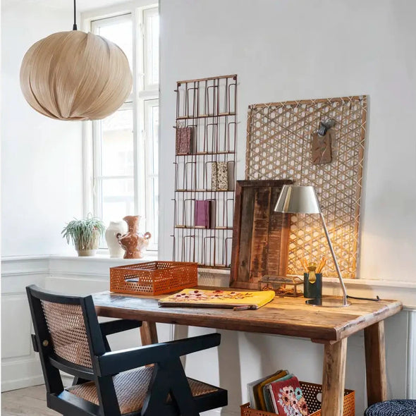 desk space with bamboo ceiling lamp