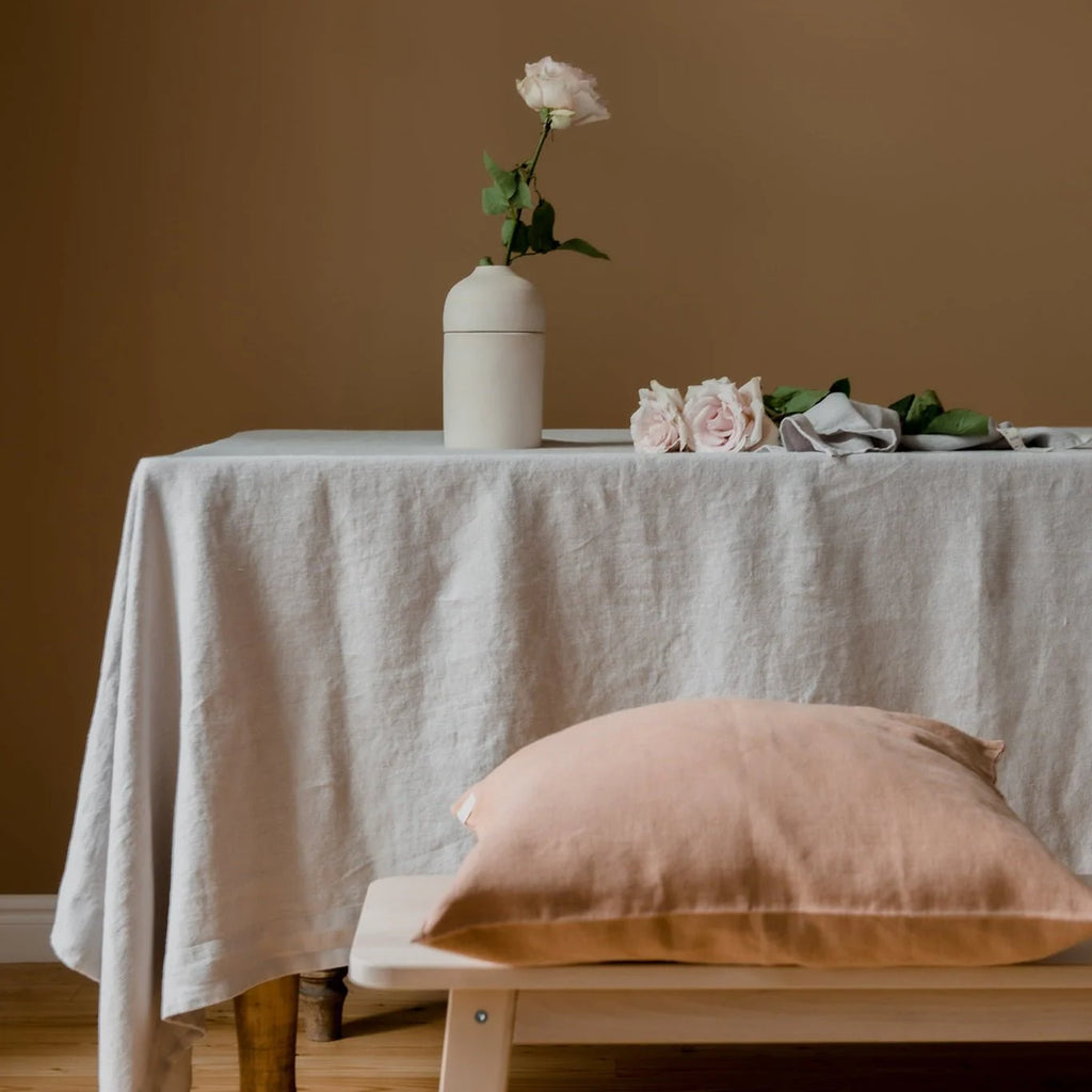 table styling with linen cushion and tablecloth