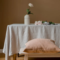 table styling with linen cushion and tablecloth