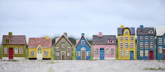Row of colourful ceramic houses Ib laursen