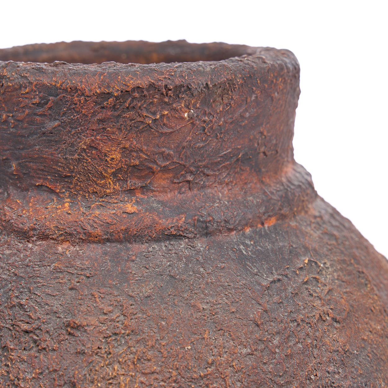 Close-up of a rusted terracotta pot 