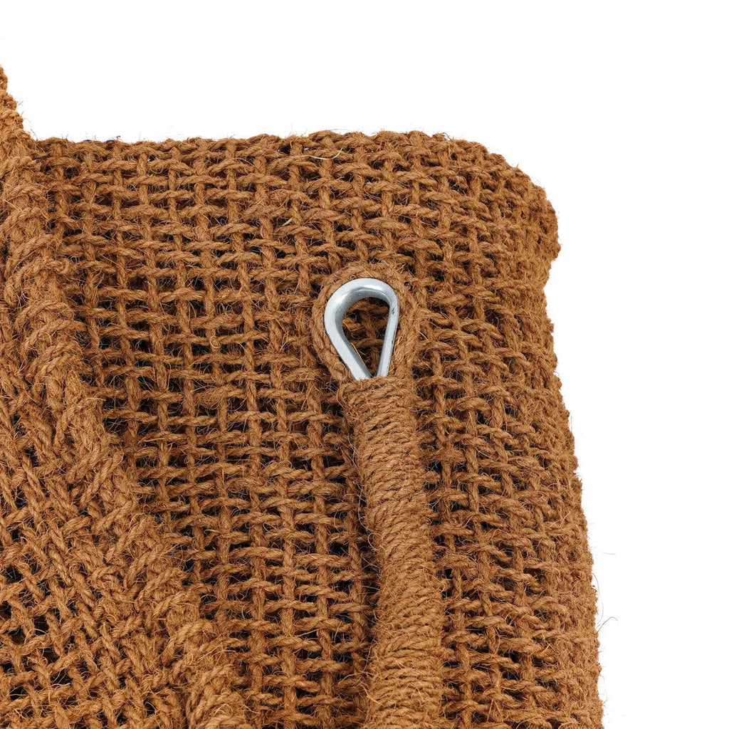 Close-up of a brown woven coconut sun shade with a metal ring
