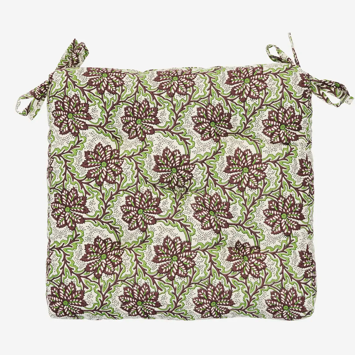 Floral patterned cushion cover with green and brown design by Madam Stoltz