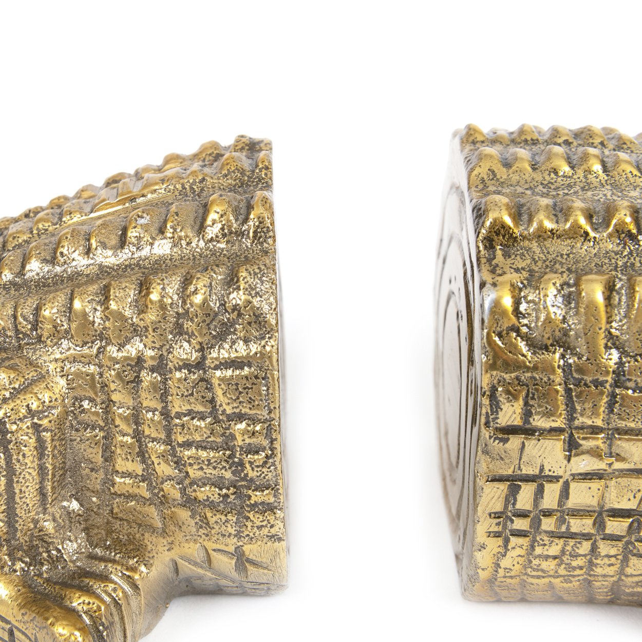 close-up crocodile bookends brass