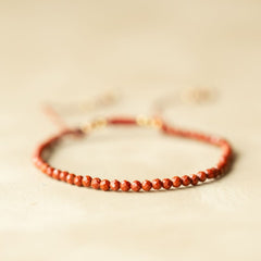 Red jasper beaded bracelet by Muja Juma