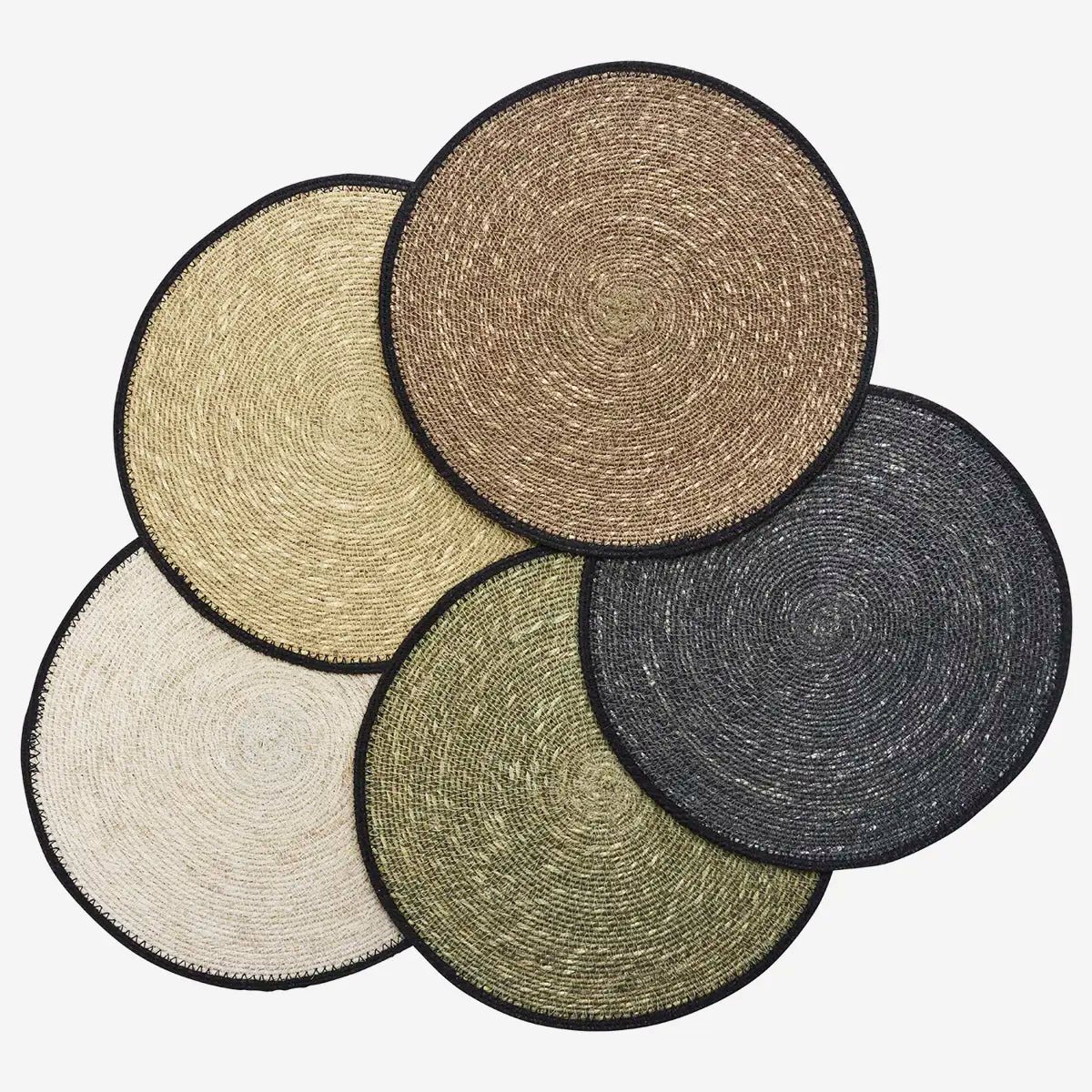 Five round woven placemats with black edges in beige, tan, cream, olive green, and charcoal gray.