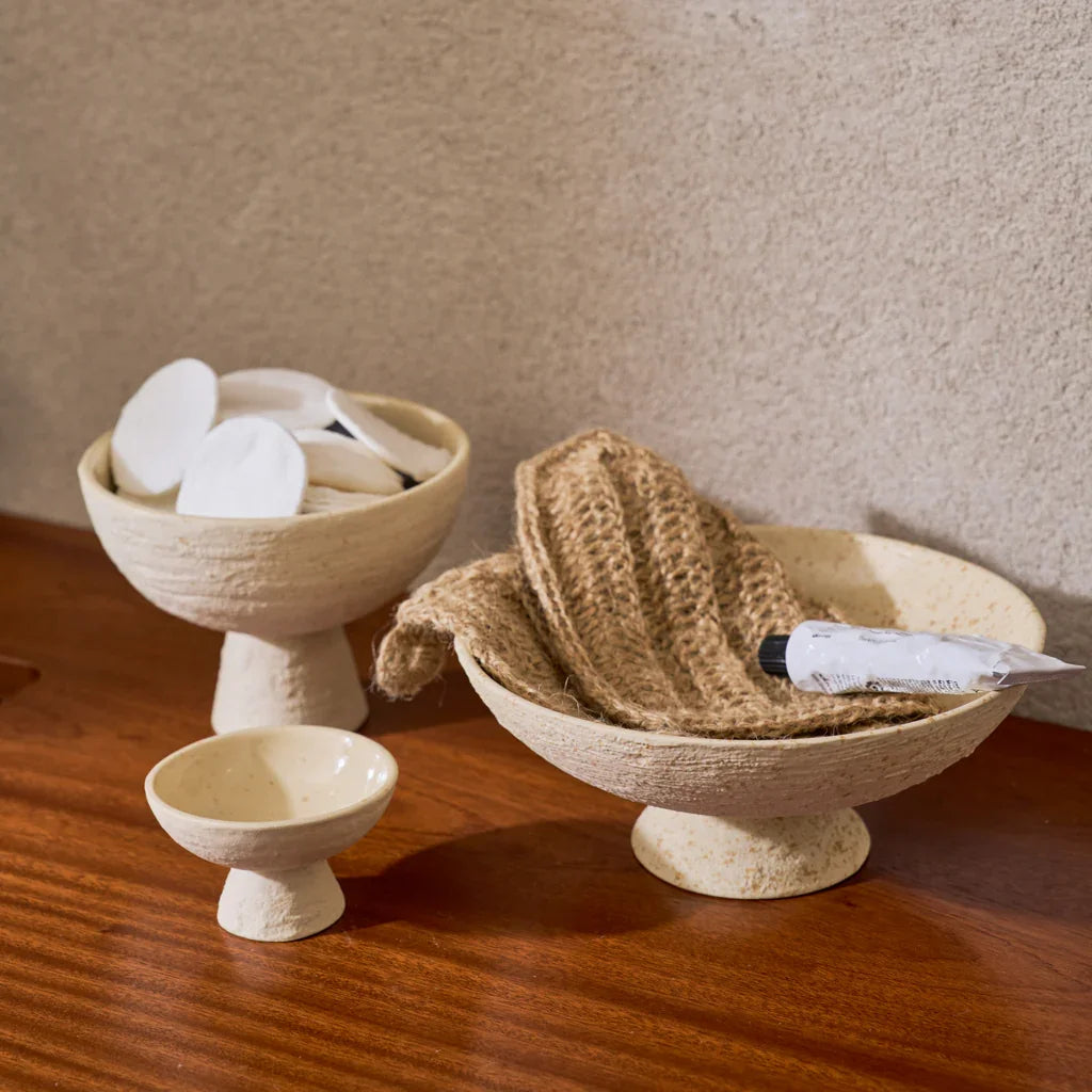 flat cream bowl in bathroom setting