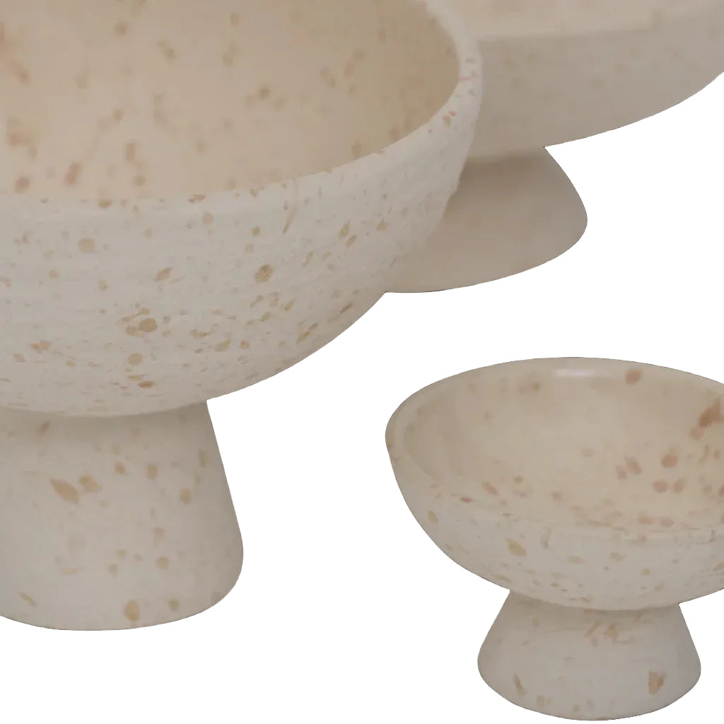 different sized cream bowl