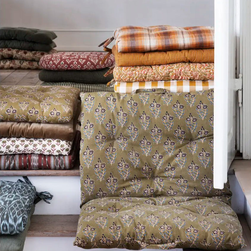 multiple chair pads stacked together