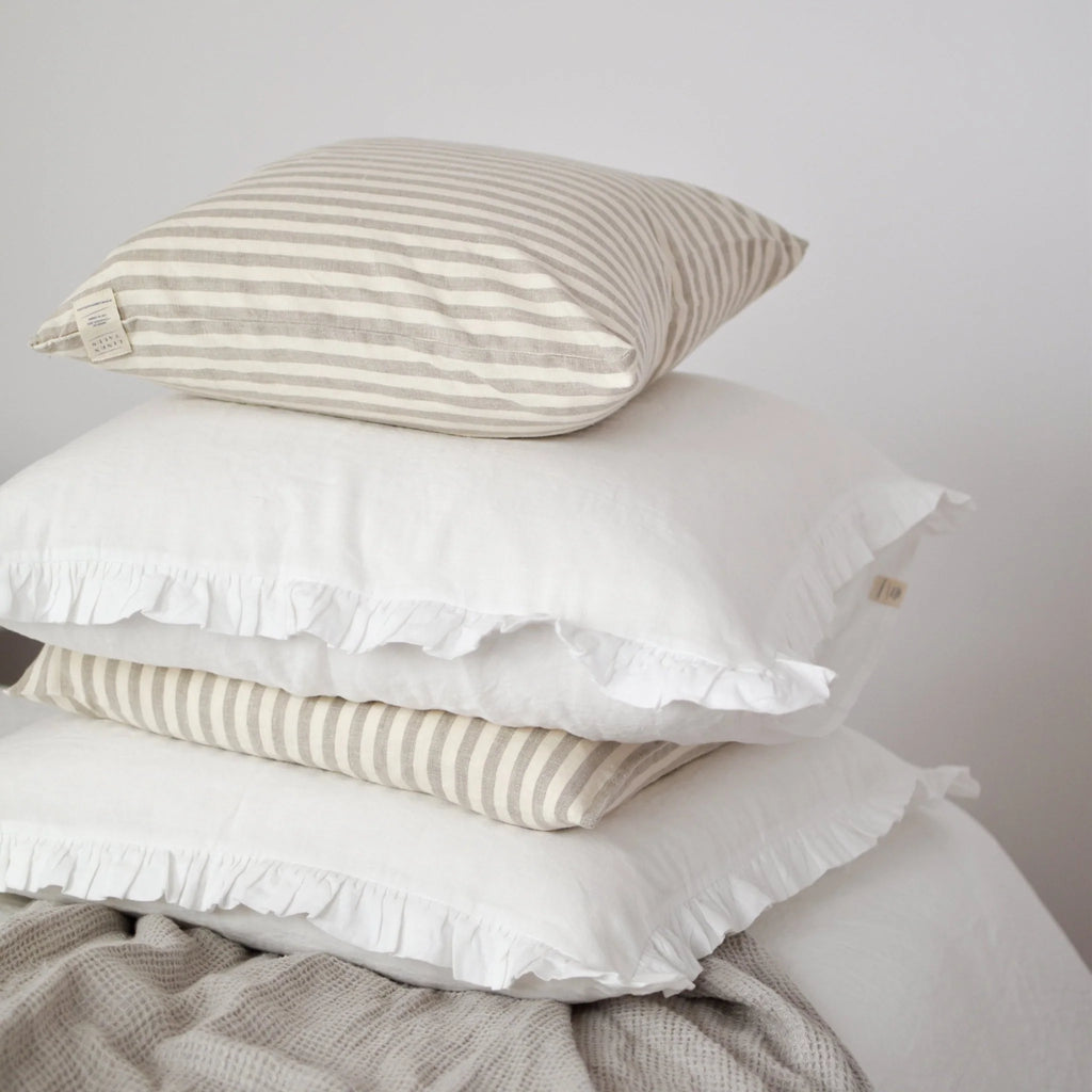 stack of linnen cushions Linen Tales