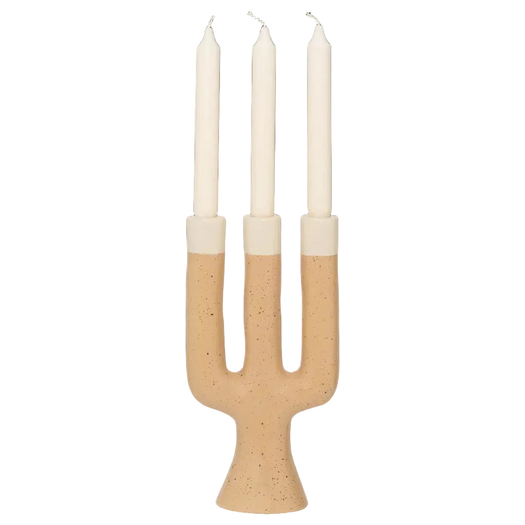nox candle holder with candles in it