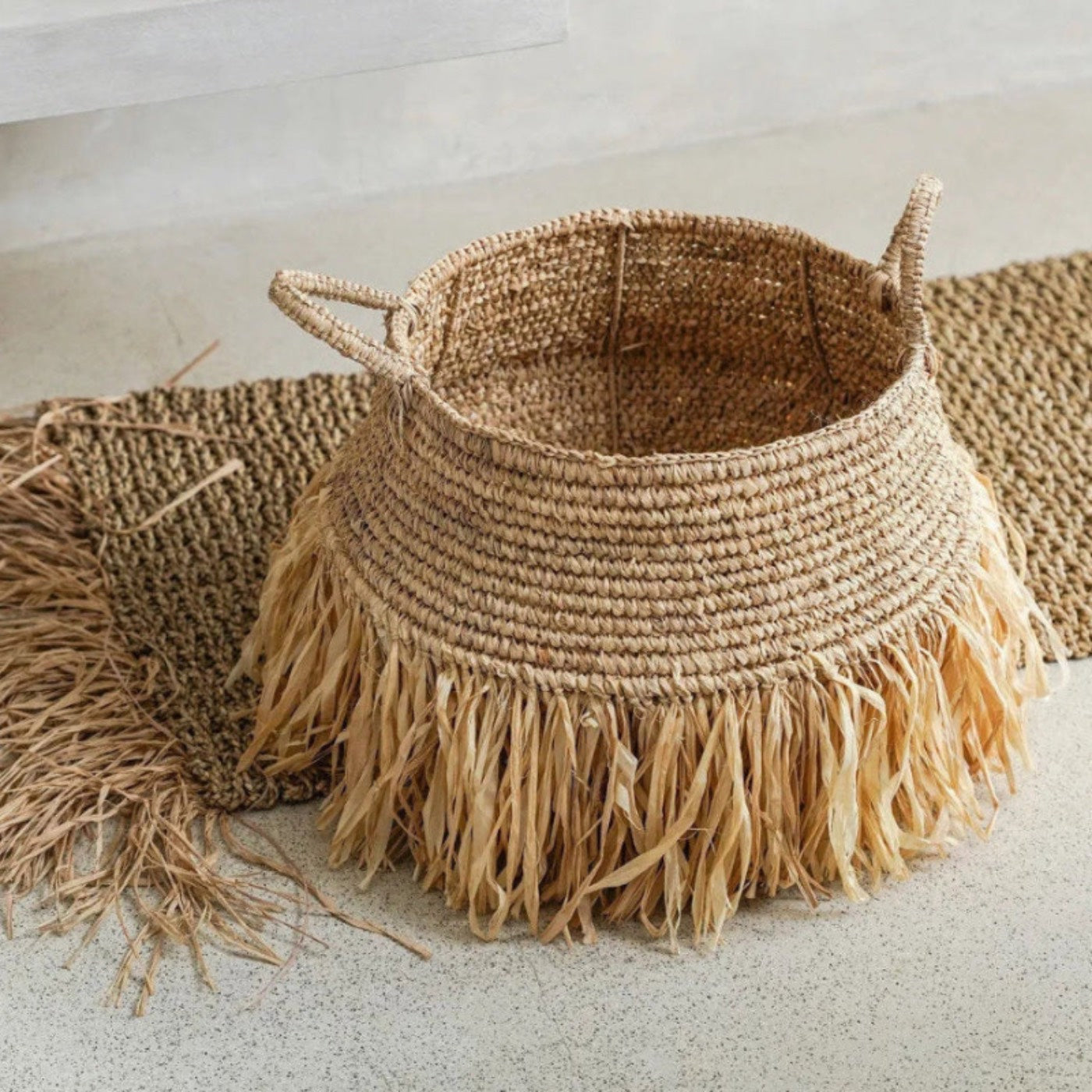 Woven basket with fringe 