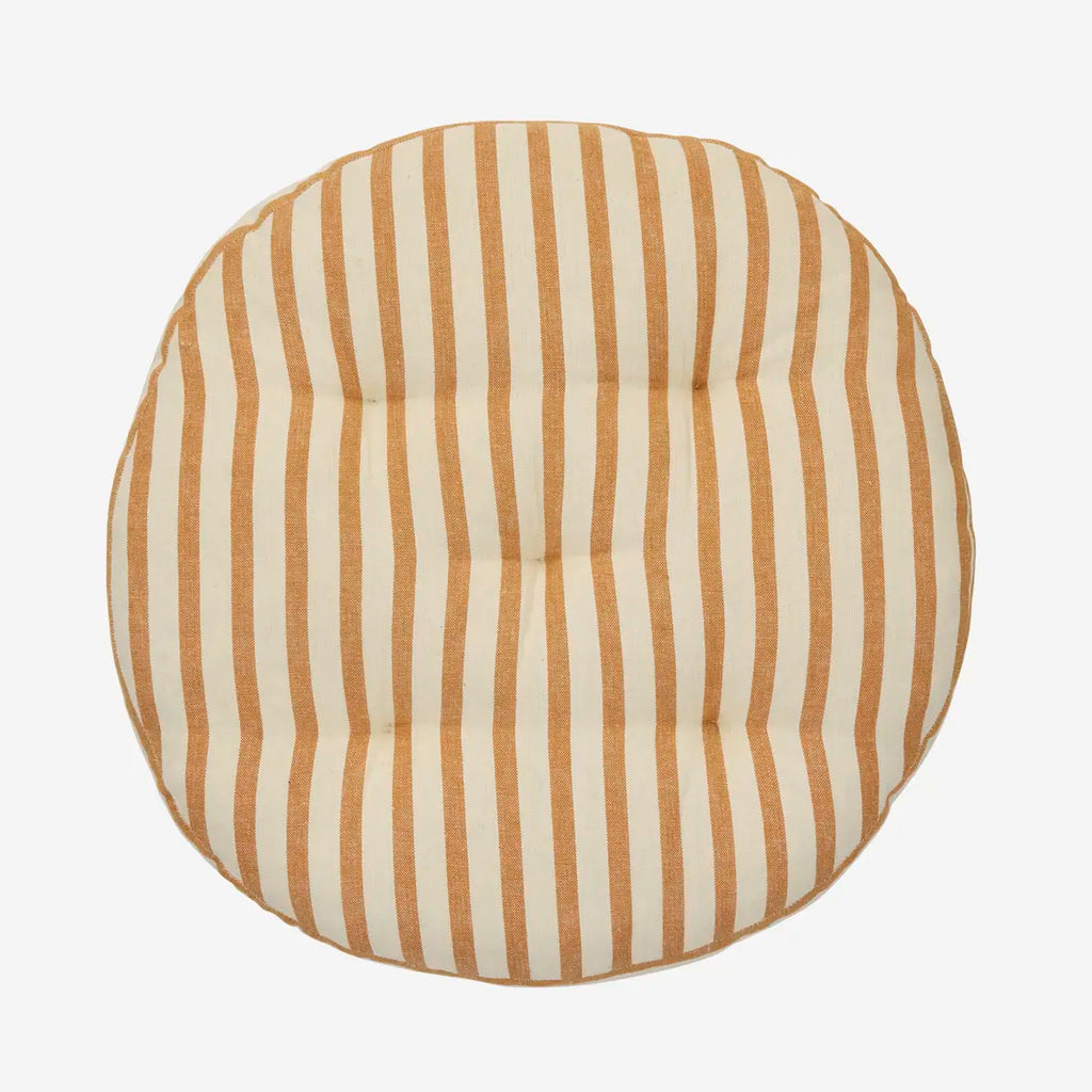 Round cushion with brown and white vertical stripes