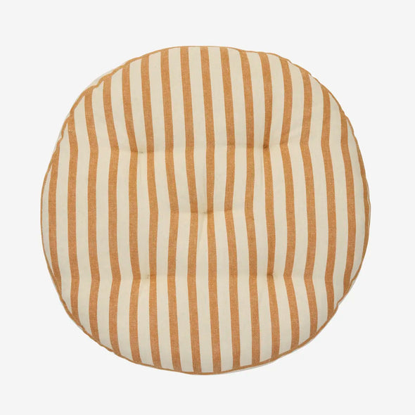 Round cushion with brown and white vertical stripes