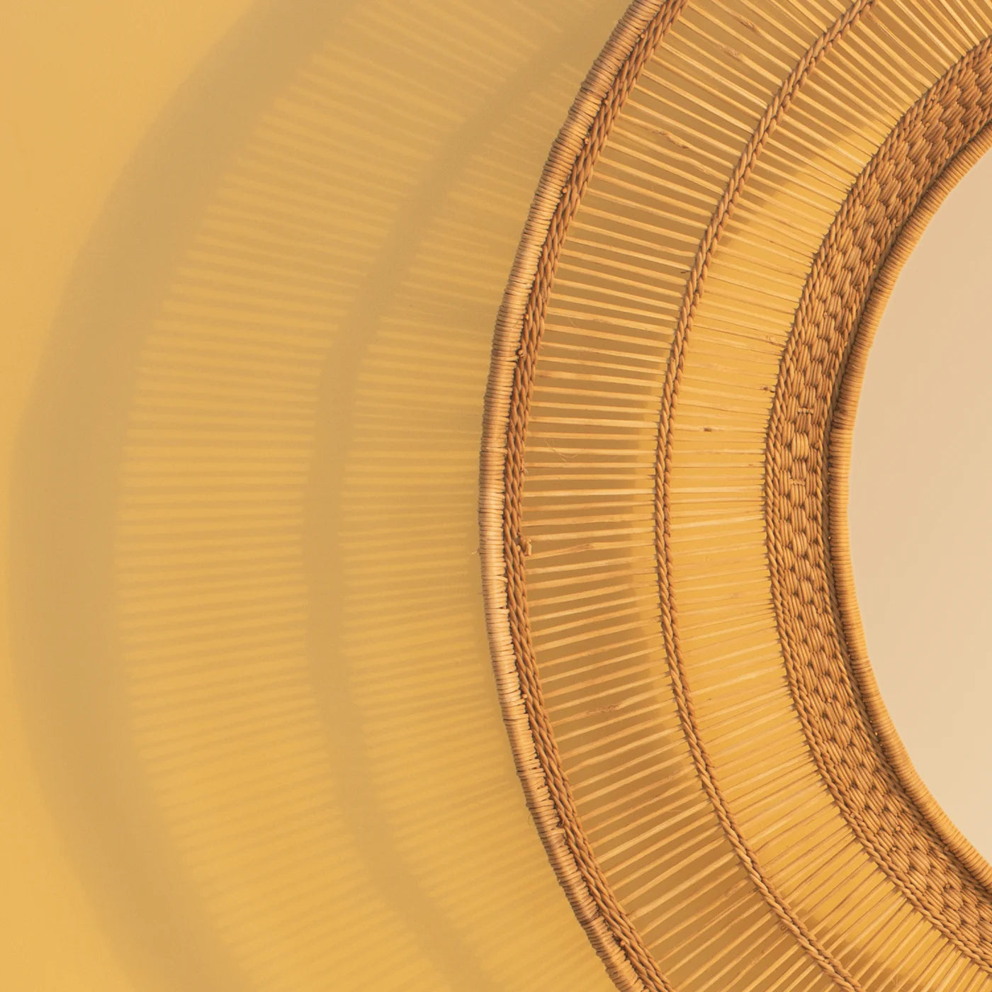 round Malawi mirror natural rattan 75cm close up