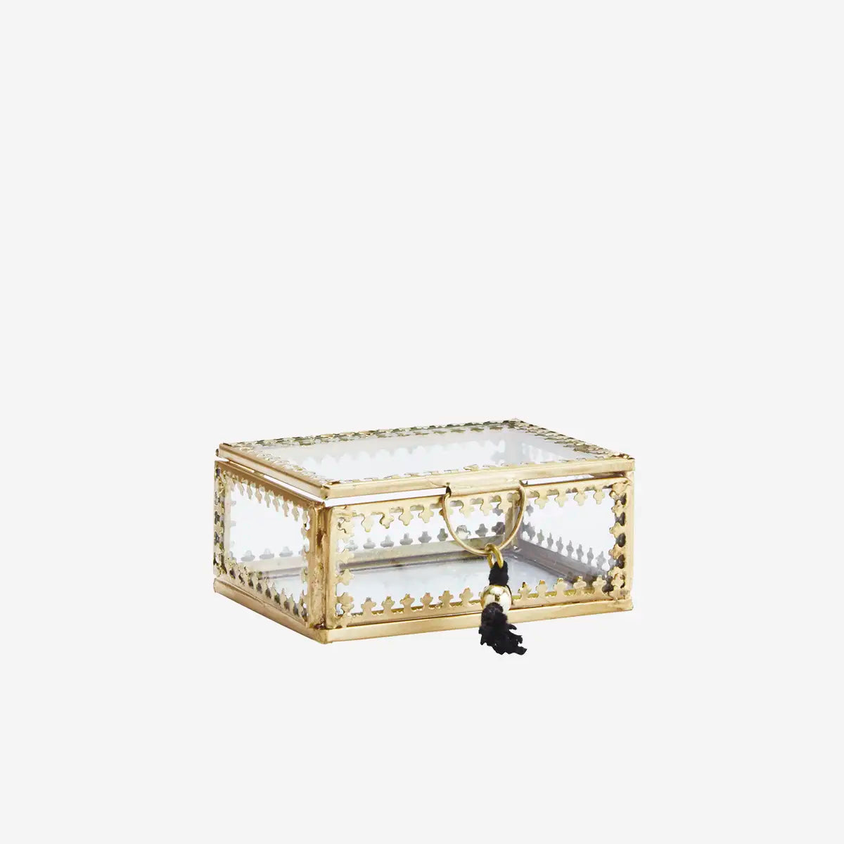 Decorative jewellery box with gold frame and glass top and tassel