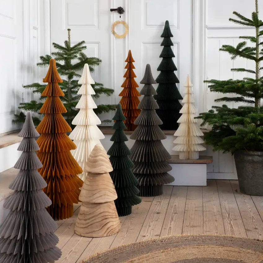 standing paper Christmas trees in by Madam Stoltz