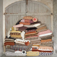 velvet bolster cushions by Madam Stoltz