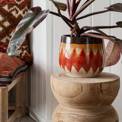 wooden stool with a plant pot on it by Madam Stoltz